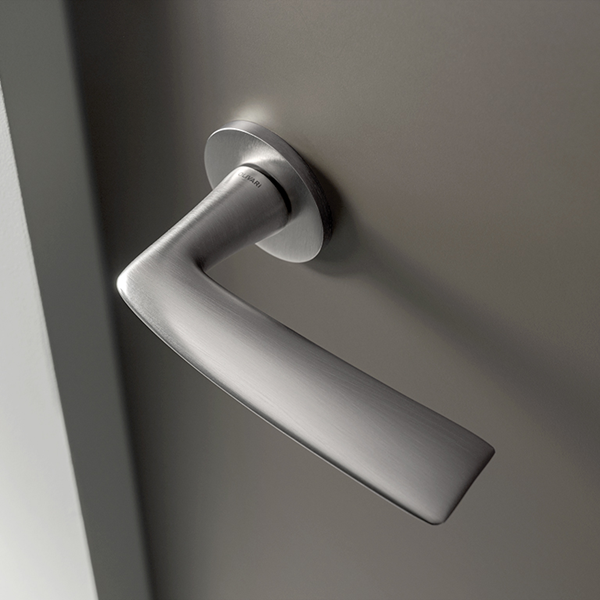 MISS Lever Handle on Low Rose MISS Lever Handle on Low Rose by Philippe Starck